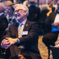 Guests smiling at the Enrichment program.